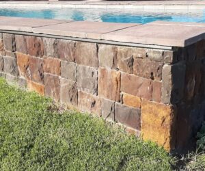 Natural stonework for pool - square and brick design