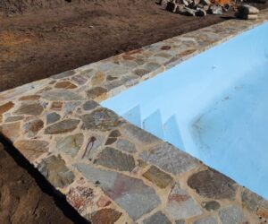natural stone paving around pool